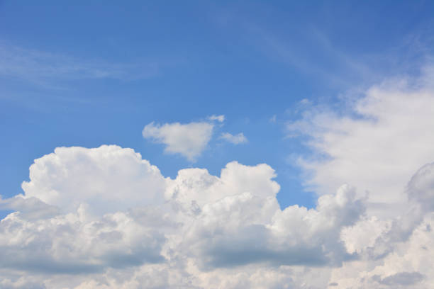 istock a background of the blue sky with white cumulus clouds 2193677096
