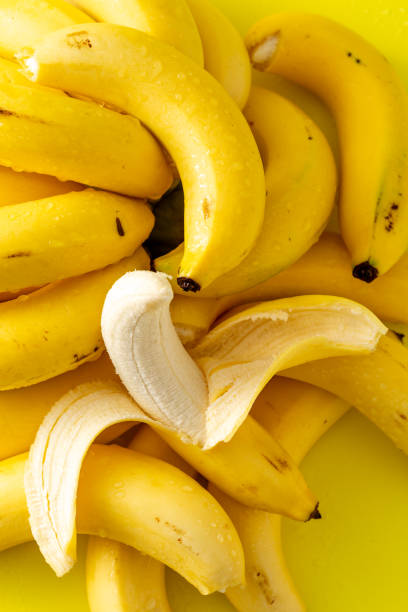 istock Banana on yellow background 2193677899