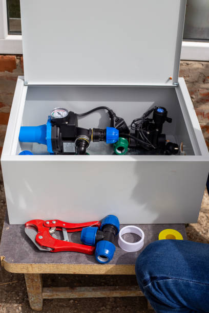 istock installation of the automatic control unit for the drip irrigation system 2193678441