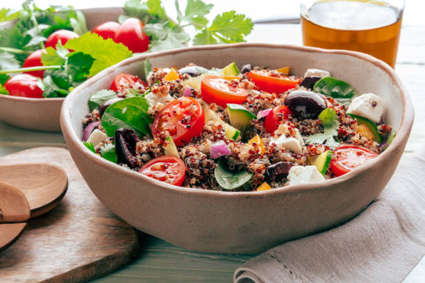 Quinoa salad, healthy Mediterranean lunch with fresh organic vegetables
