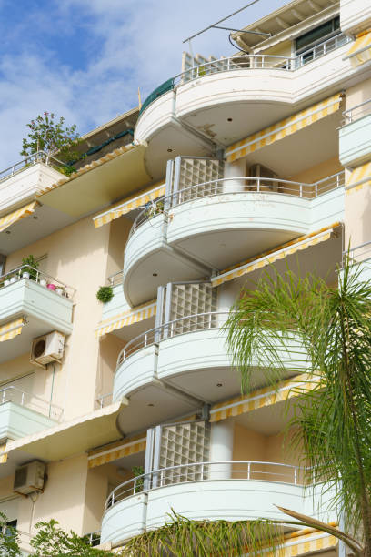 istock Vertical image modern minimalist apartment building in Mediterranean style with air conditioning in Albania on the sea coast. Concept of selling a house abroad, renting apartments 2193686922
