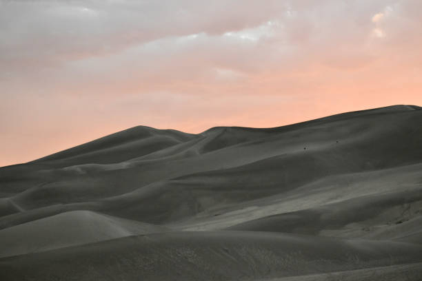 Footprints in huge sand dunes in Great Sand Dunes National Park in Colorado in western USA, North America.