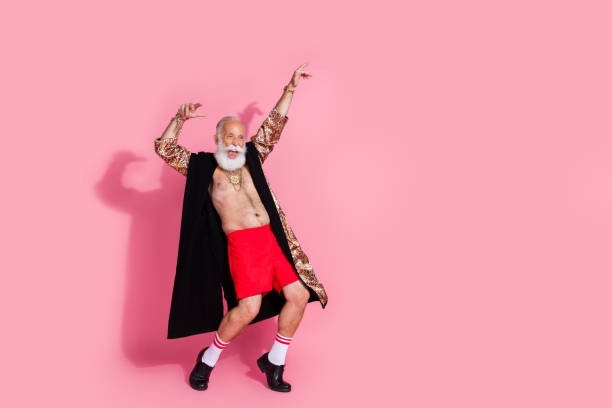 istock Full size photo of eccentric aged man leopard bathrobe dancing empty space isolated on pink color background 2193689801