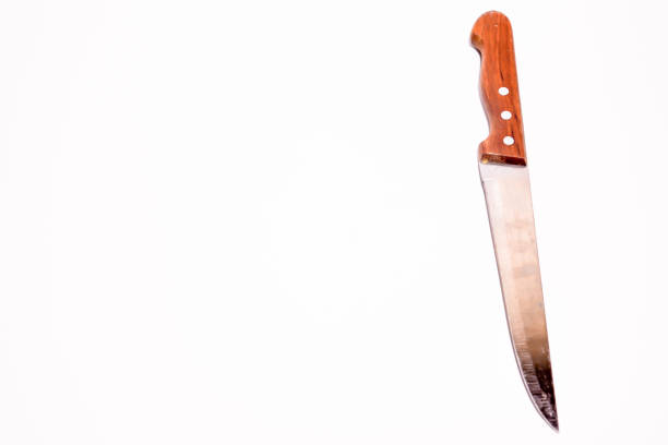 Knife on a white background. Kitchen knife with a wooden handle. Wooden knife