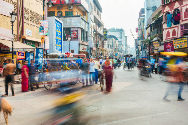 colorful street life in Varanasi India long exposure of colorful streets in Varanasi India indian wedding stock pictures, royalty-free photos & images