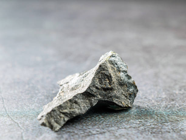 istock Close-up of basalt stone on gray background 2193694816