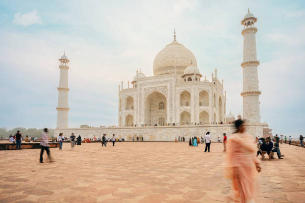 motion blurred people in front of Taj Mahal in Agra