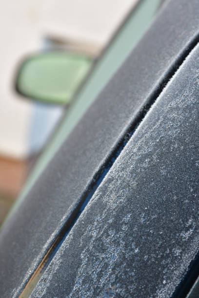 istock car with frozen window in winter in Germany 2193695934