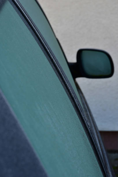istock car with frozen window in winter in Germany 2193695958