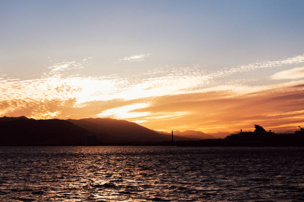 The Alboran Sea during sunset, near Costa del Sol, the westernmost portion of the Mediterranean Sea. Holidays and enjoying life concept, copy space