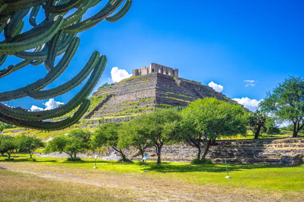 El Pueblito pyramid in Queretaro, surrounded by green vegetation