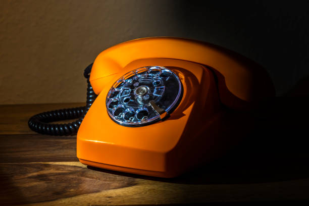 Old telephone in the shadow