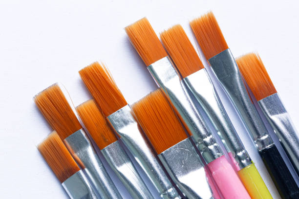 Multicolored brushes isolated on white background,Paint brushes and paint on an background.