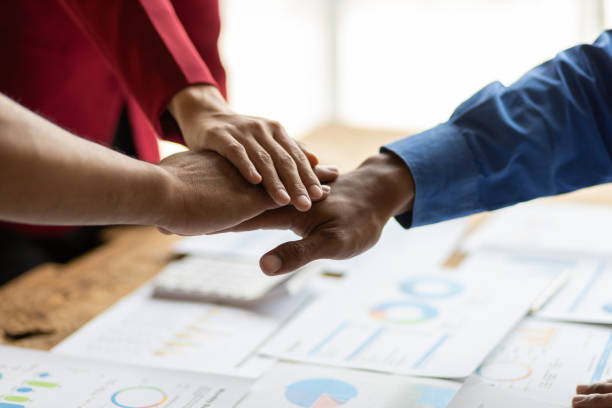 istock Collaboration and unity of people in an organization. 2193704852