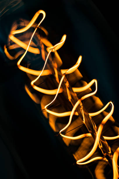 light bulb against yellow background
