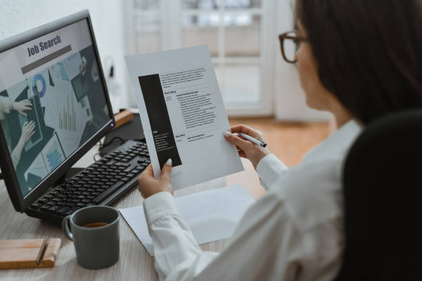 istock Female Checking Her CV For Grammatical Mistakes Before Applying for Jobs 2193707365