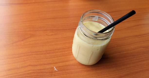istock a glass of milkshake on the table 2193710645