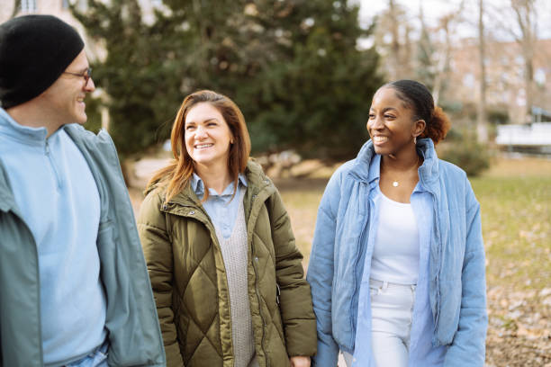 istock Diverse young people enjoying sunny autumn day in park 2193712134