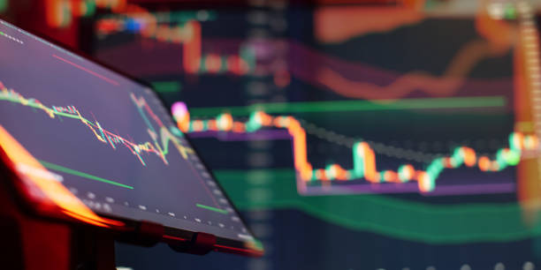 istock Abstract financial trading interface with dynamic stock market candlestick chart and blurry light effects 2193713474