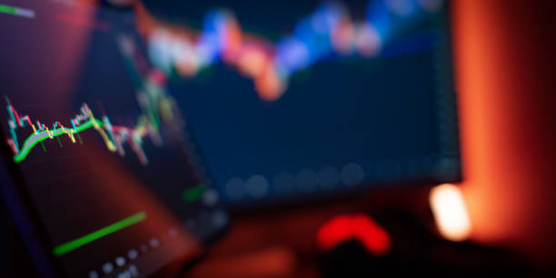 istock Abstract financial trading interface with dynamic stock market candlestick chart and blurry light effects 2193713672