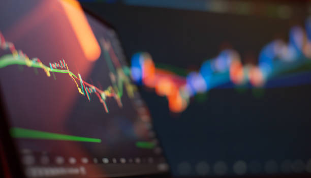 istock Abstract digital financial chart with colored candlestick charts, trend lines and network data visualization 2193713700