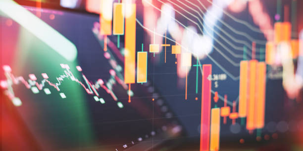istock Abstract stock trading interface with green candlestick chart and warm sunset gradient overlay 2193713764