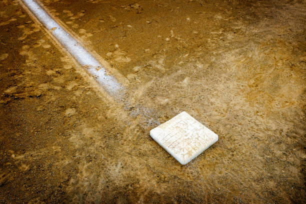 istock Baseball Diamond Base or Plate White Against Dark Dirt for Competition and Playing Game 2193713997