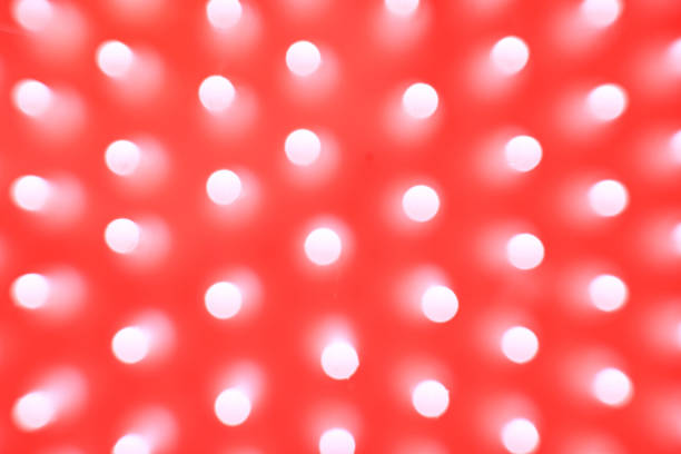 Red spotlights building a big circle.