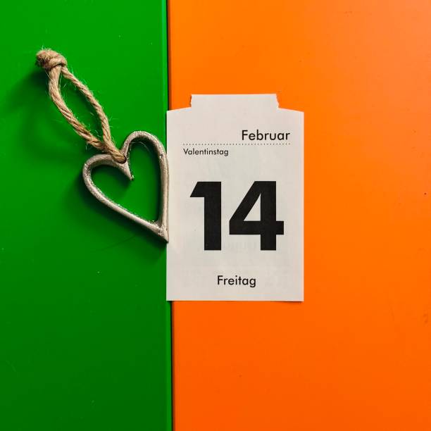 Valentine's day calendar sheet and a silver heart shape