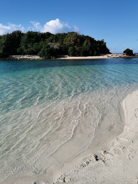 istock Seascape with sandy beach, emerald water and blue sky. Ksamil, Albania 2193716237
