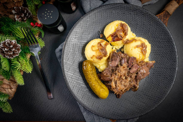 istock Chicken liver stewed with onion. 2193720369