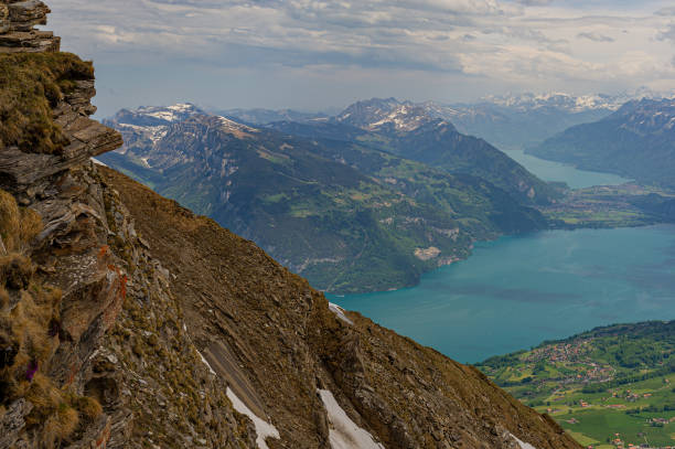 Snowy peaks and mountains and lakes, Switzerland. Web banner.