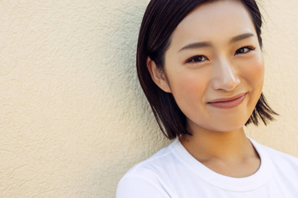 istock Woman Smiling Joyfully in a Close-Up Portrait 2193737647