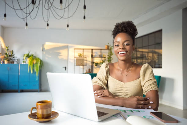 istock Beautiful woman working on laptop in an office 2193739920