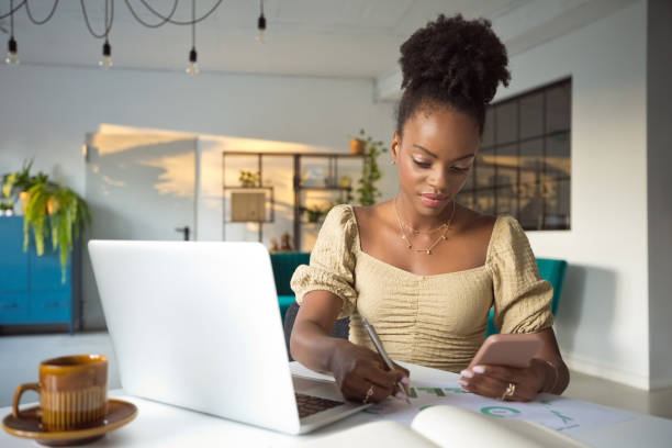 istock Beautiful woman working on laptop in an office 2193739971