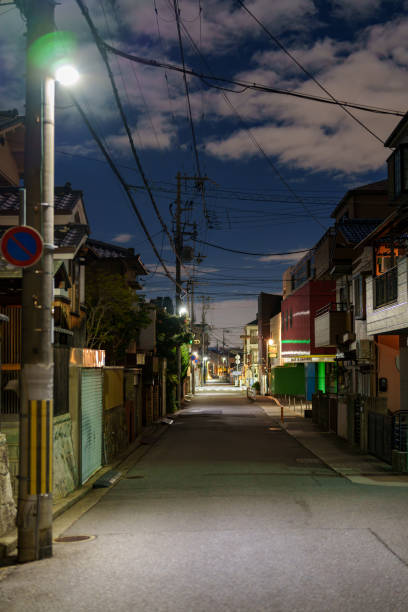 istock Scenery of back alley at night 2193743210