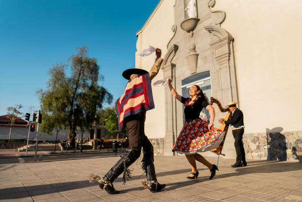 istock Couple dancing at a folkloric cueca event in Santiago, Chile 2193743348