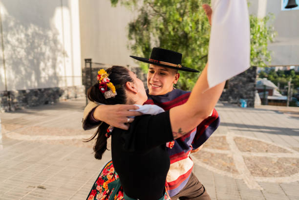 istock Couple dancing at a folkloric cueca event in Santiago, Chile 2193743371