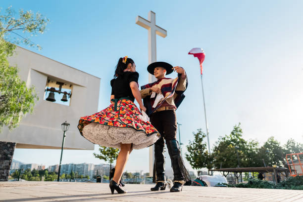 istock Couple dancing at a folkloric cueca event in Santiago, Chile 2193743420