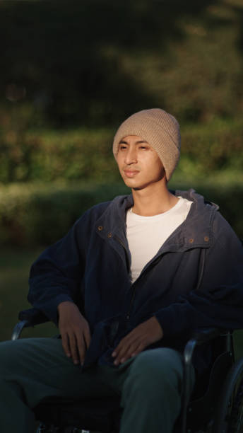 istock Man patient relaxing on wheelchair. 2193744978