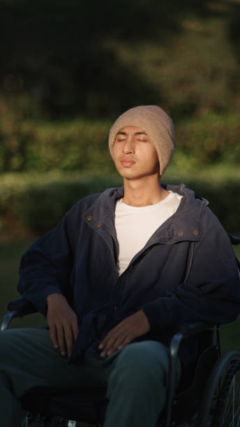 istock Man patient relaxing on wheelchair. 2193744980