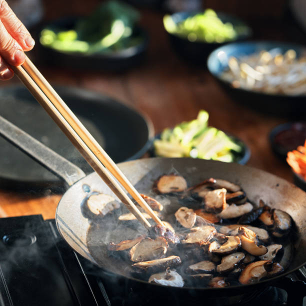 Preparing Bibimbap Korean Mixed Rice with Meat and Assorted Vegetables