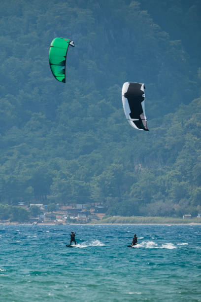 istock Two kitesurfers enjoying their holiday in Akyaka. 2193748317