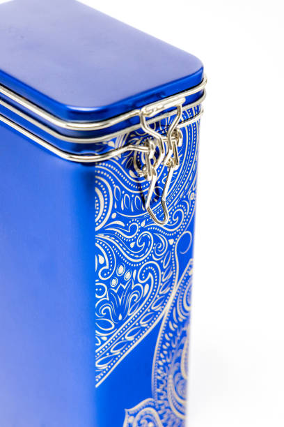 Blue alluminium coffee box with with decorative closing and decorations on the side