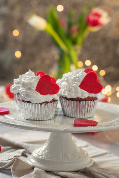 Love concept decorated cupcakes served on the plate for Valentine's Day