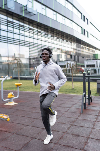 istock Young athlete man running in spot to warm up for exercing 2193757933