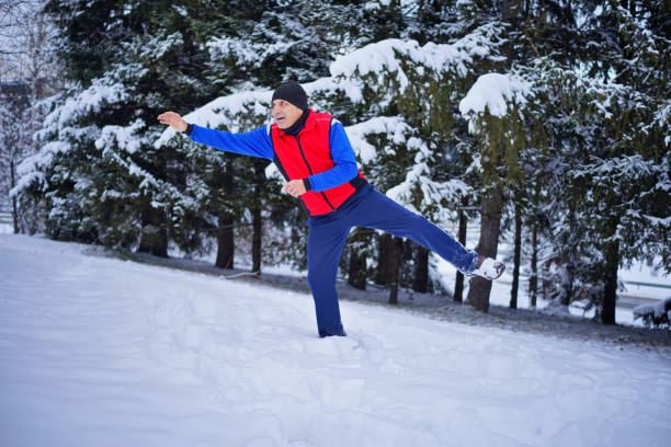 istock A Man Exercises on the Snow in the Mountains 2193759290