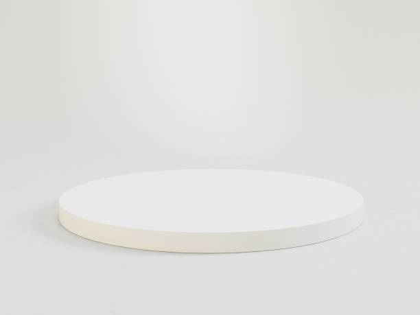 istock Minimalist table lamp with round base on a slightly elevated pedestal, elongated neck, and modern design The lamp stands against a neutral background, captured in product 3D empty podium 2193760290