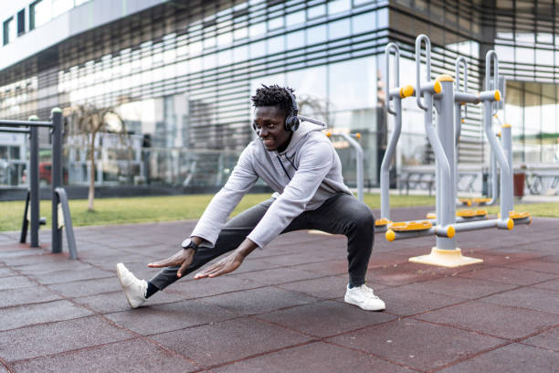 istock Young man warming up before bodyweight workout 2193760390