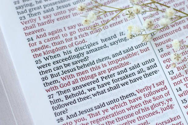 istock With God all things are possible, biblical text in open holy bible book 2193763099